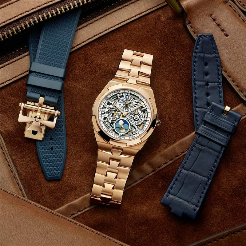 玫瑰金 Vacheron Constantin 手表，皮革背景，旁邊有兩條表帶